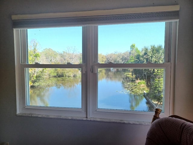 interior space featuring a water view