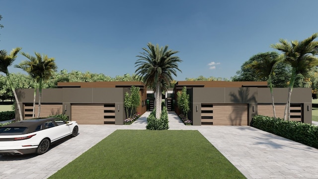 contemporary home with a front lawn