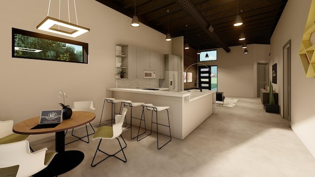 living room with wood ceiling, beamed ceiling, and a towering ceiling