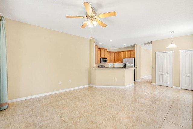 unfurnished living room featuring ceiling fan and light tile floors