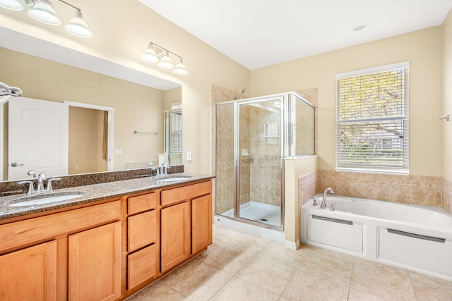 bathroom featuring tile flooring, dual sinks, plus walk in shower, and oversized vanity