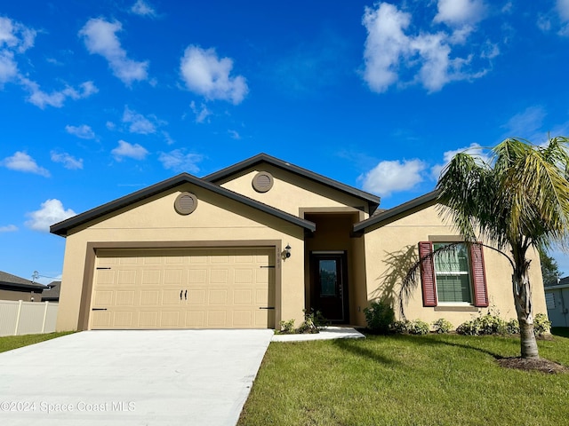 ranch-style home featuring a front yard and a garage