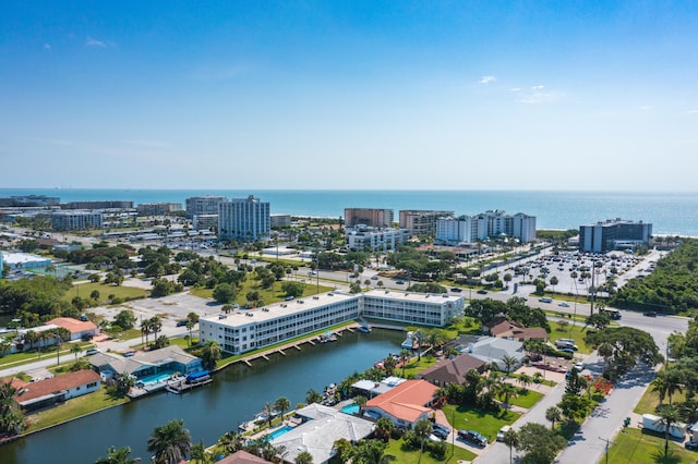 drone / aerial view with a water view