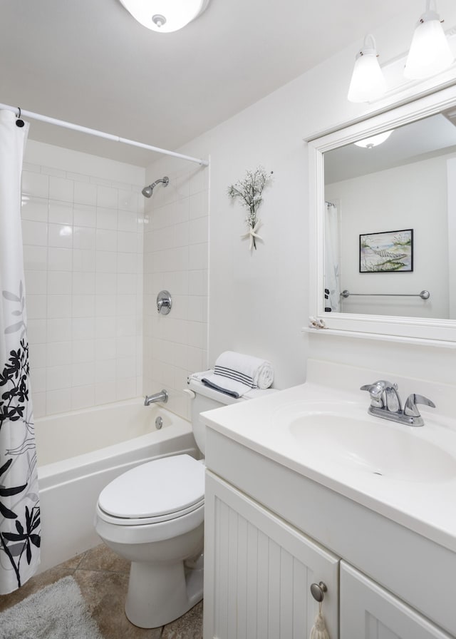 full bathroom with vanity, tile floors, toilet, and shower / bathtub combination with curtain