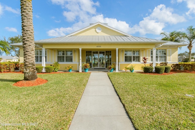 view of front facade with a porch and a front yard