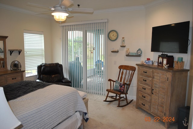 carpeted bedroom featuring access to outside, multiple windows, crown molding, and ceiling fan