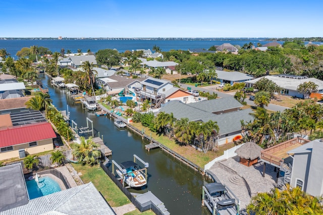 birds eye view of property featuring a water view