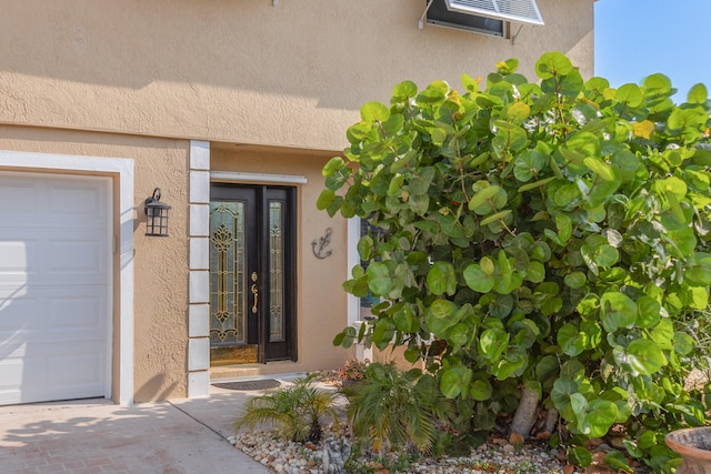 entrance to property with a garage