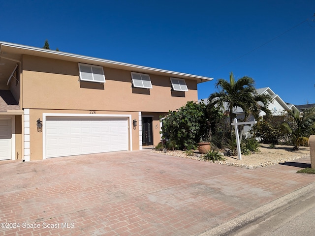 view of front of home featuring a garage