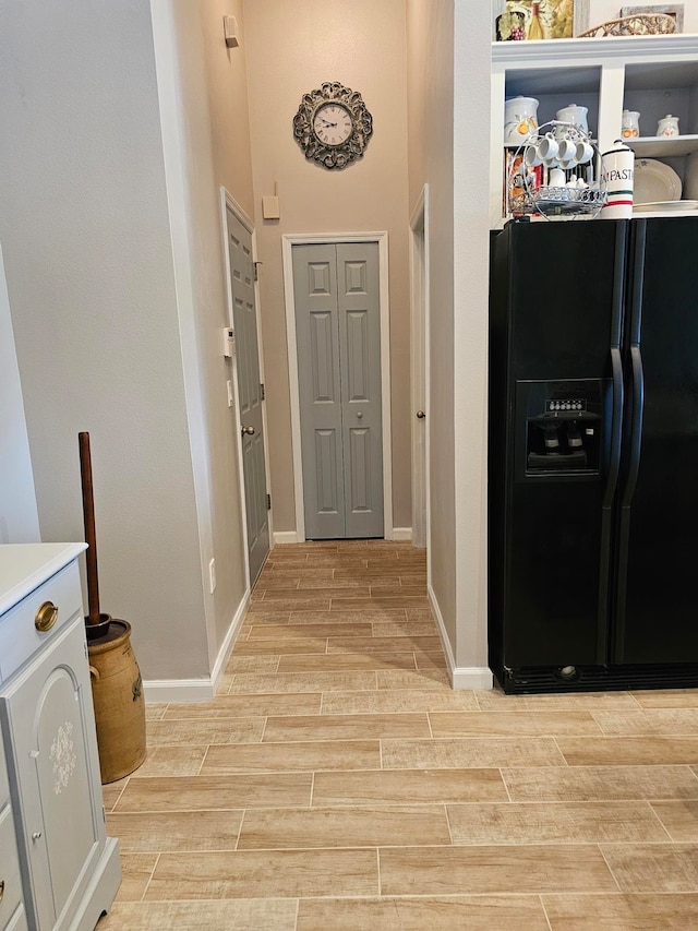 hallway featuring light wood-type flooring