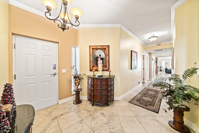 foyer with an inviting chandelier, crown molding, light tile floors, and a textured ceiling