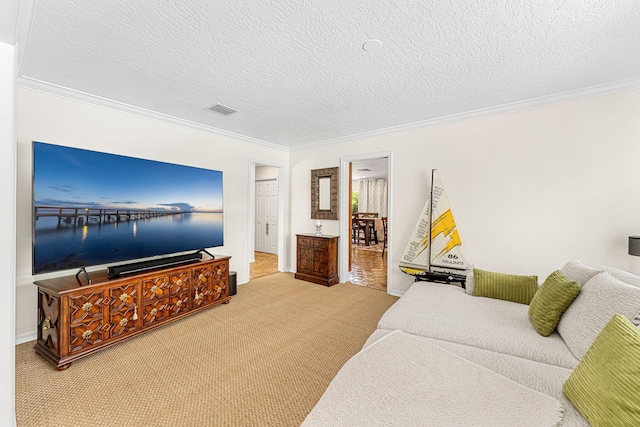 bedroom featuring ornamental molding, carpet flooring, and a textured ceiling