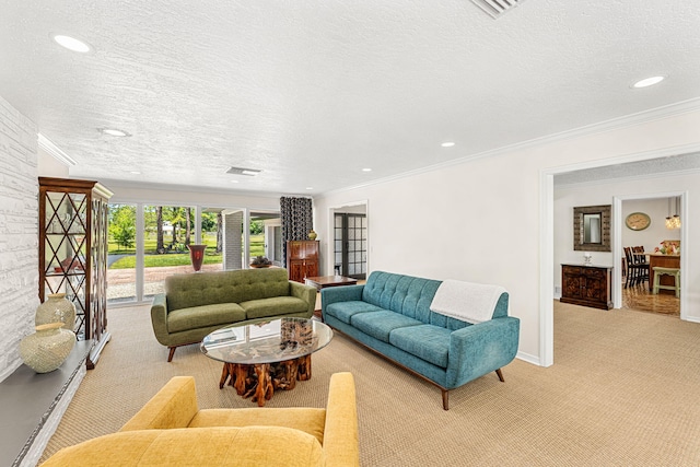 carpeted living room featuring ornamental molding and a textured ceiling