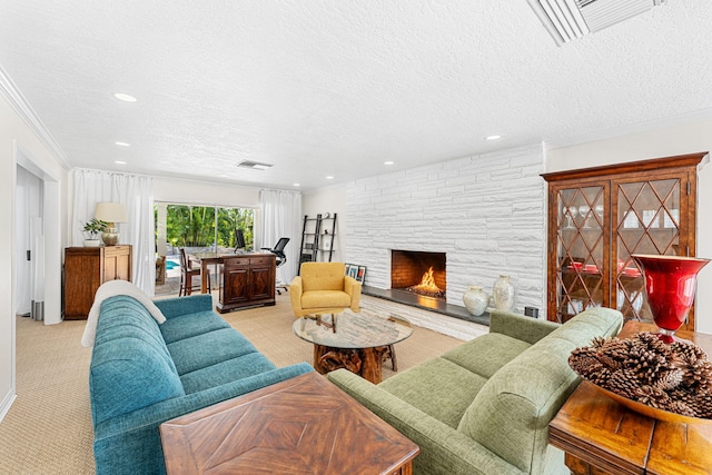 carpeted living room with a textured ceiling, crown molding, and a stone fireplace