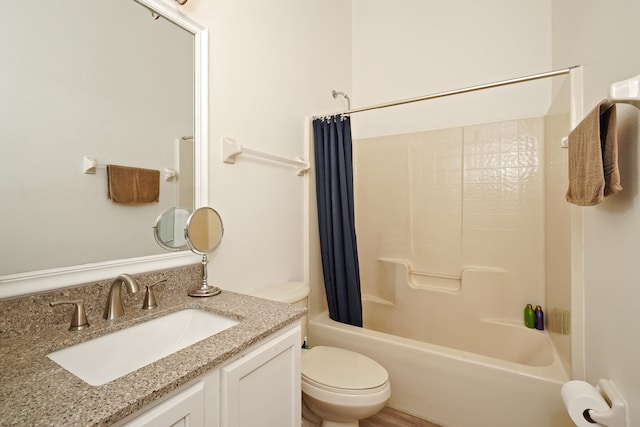 full bathroom with vanity, toilet, and shower / bath combo