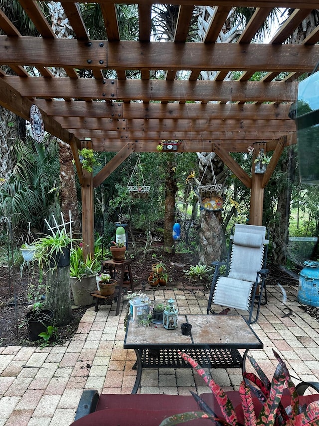 view of patio featuring a pergola