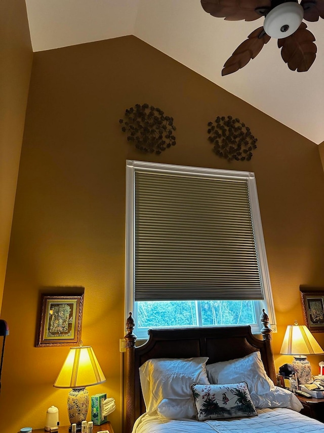 bedroom featuring lofted ceiling and ceiling fan