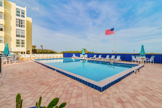 view of pool featuring a patio area