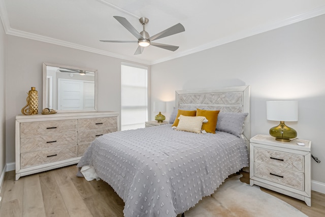 bedroom with ceiling fan, ornamental molding, and light hardwood / wood-style flooring