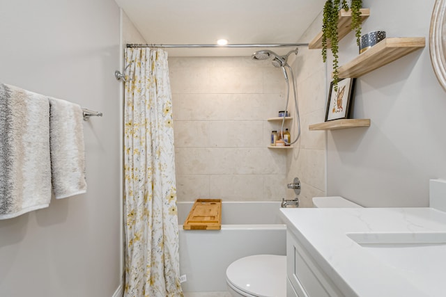 full bathroom with shower / tub combo, vanity, and toilet