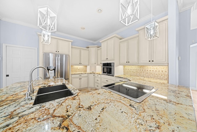 kitchen with pendant lighting, tasteful backsplash, appliances with stainless steel finishes, and sink