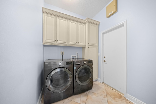 clothes washing area featuring separate washer and dryer, cabinets, light tile floors, and hookup for a washing machine