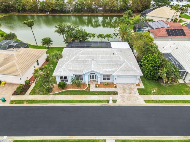 bird's eye view with a water view