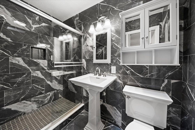 bathroom with backsplash, a shower with shower door, toilet, and tile walls