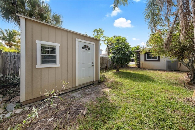 view of outdoor structure featuring a yard