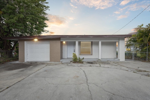 single story home featuring a garage