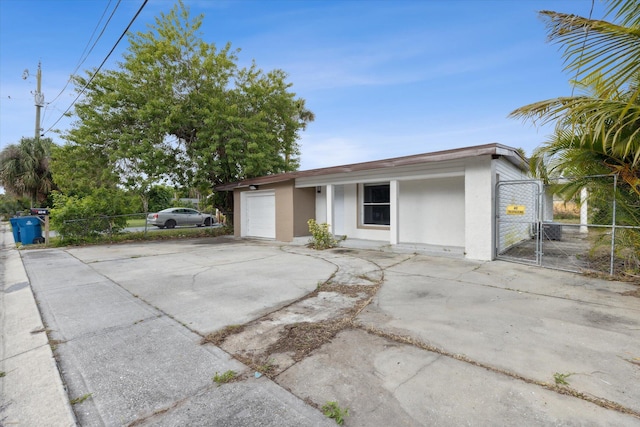 single story home featuring a garage