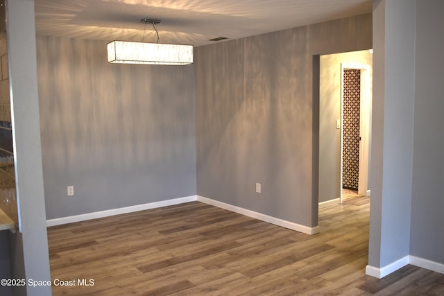 unfurnished dining area with hardwood / wood-style floors