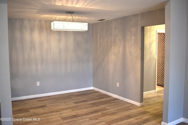 unfurnished dining area with hardwood / wood-style floors