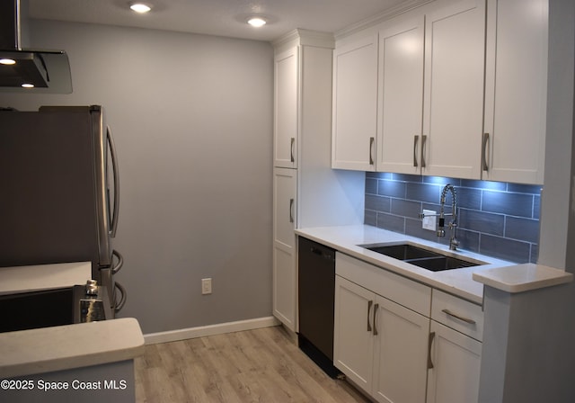 kitchen featuring stainless steel fridge, dishwasher, and white cabinets