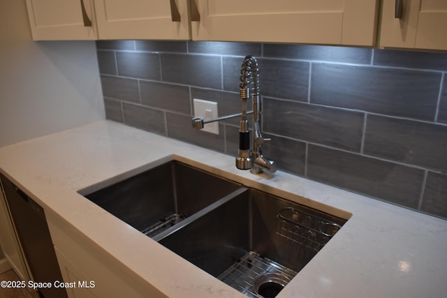 kitchen with sink and decorative backsplash