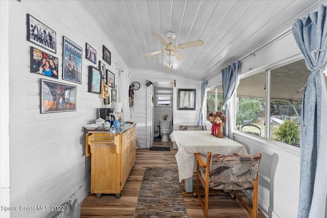 interior space with vaulted ceiling, ceiling fan, and wood ceiling