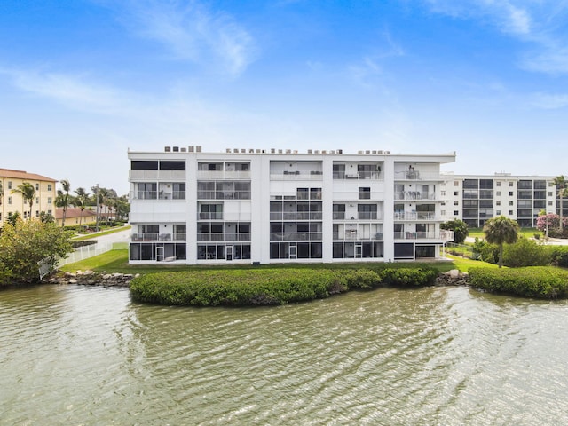 view of property with a water view