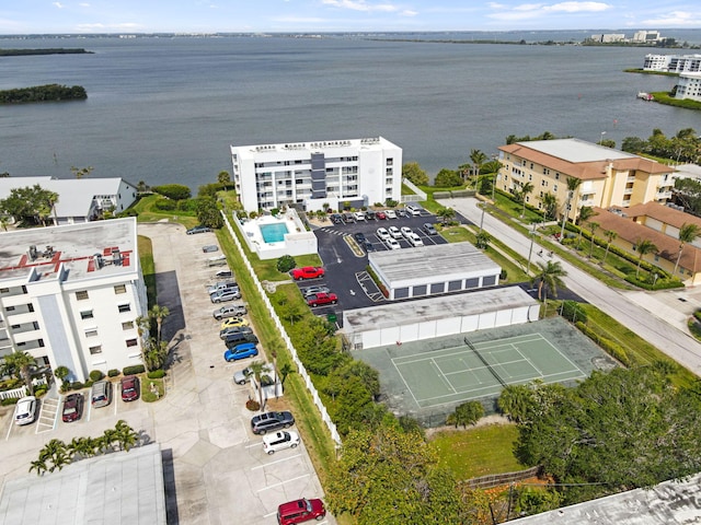 birds eye view of property featuring a water view