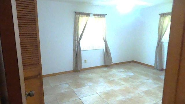 view of tiled empty room