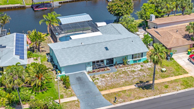 birds eye view of property featuring a water view