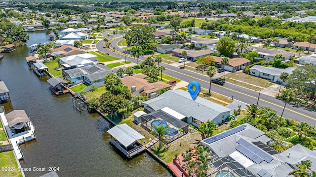 bird's eye view with a water view