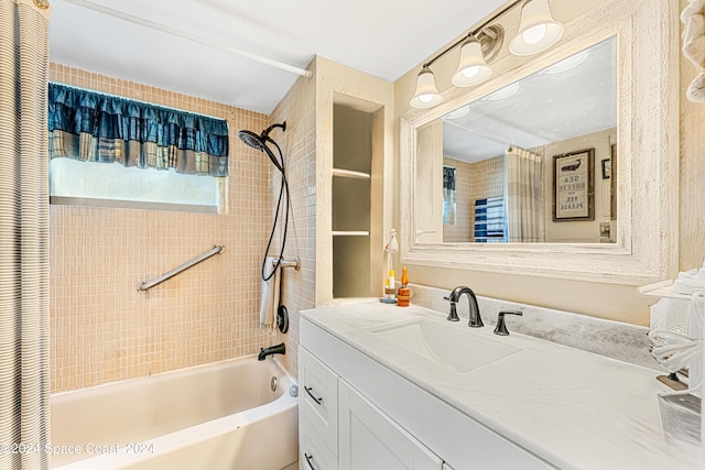 bathroom featuring shower / tub combo with curtain and vanity