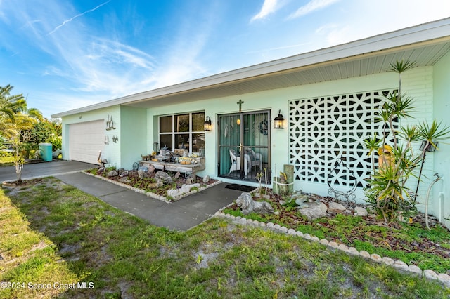 view of front of property with a garage