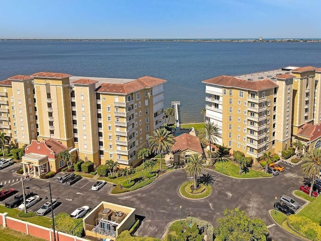 birds eye view of property with a water view