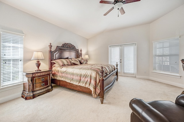 carpeted bedroom with lofted ceiling and ceiling fan