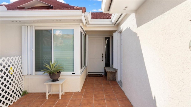 doorway to property with a patio