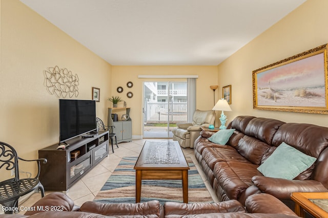 living room featuring light tile flooring