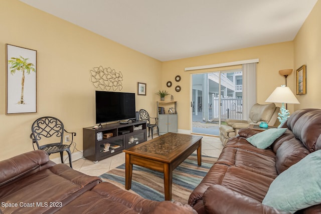 living room featuring light tile flooring