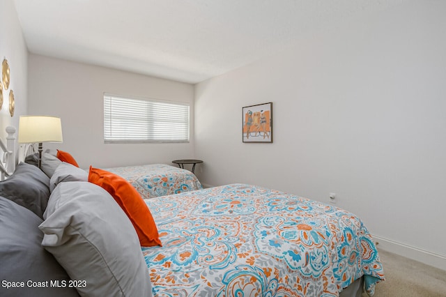 bedroom featuring carpet flooring