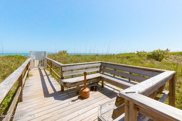 deck featuring a water view